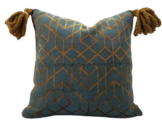 Elevate your home decor with our luxurious Romonique Copper Designer Geometric Cushion. Handmade from Romo Botero copper fabric, this unique designer cushion exudes elegance and sophistication. The copper tasseled accents add a touch of opulence to any room. Elevate your space with international designer fabric.