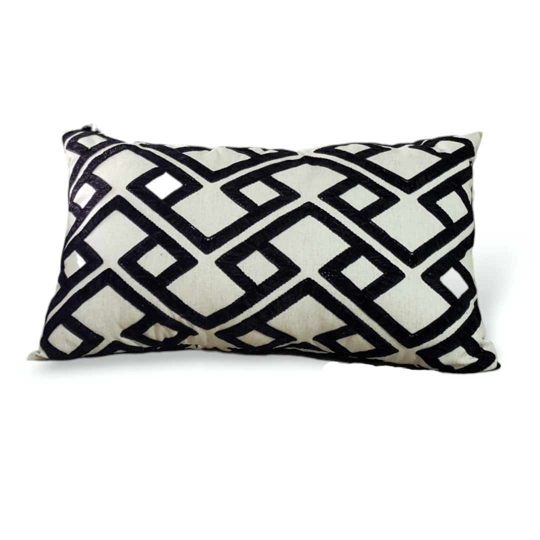 Kimberly Melanoid Black and White Geometric Pillow CoverElevate your home decor with the Kimberly Melanoid Pillow Cover. Made from designer PKaufmann accolade fabric, this handcrafted cover features a trendy black and off-white geometric design with a textured finish. Revamp your space with this stylish and unique addition.