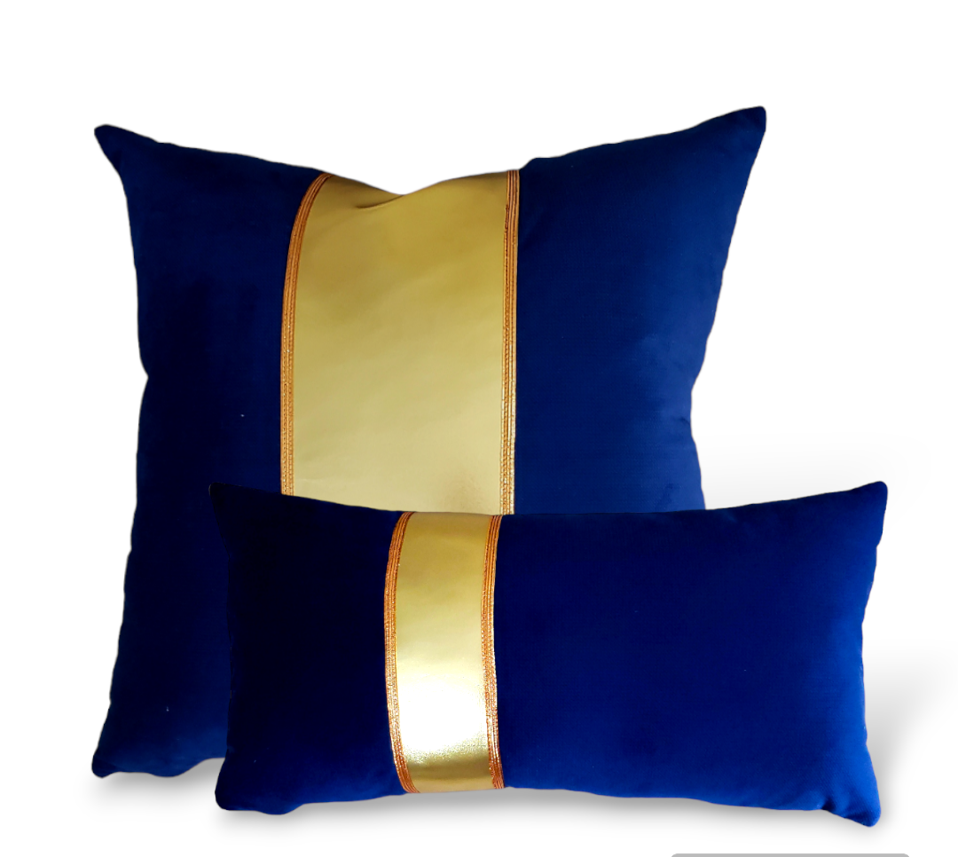Introducing the Royal Deluxe Luxury Lumbar Designer Decorative Pillow - a regal piece of home décor with a timeless aesthetic. Handcrafted with high-end microfiber, this unique pillow features a striking royal blue and gold palette, designed to impress with its exclusive embellishments. Its invisible zipper ensures that its beauty is retained, creating an elegantly luxurious addition to any home.