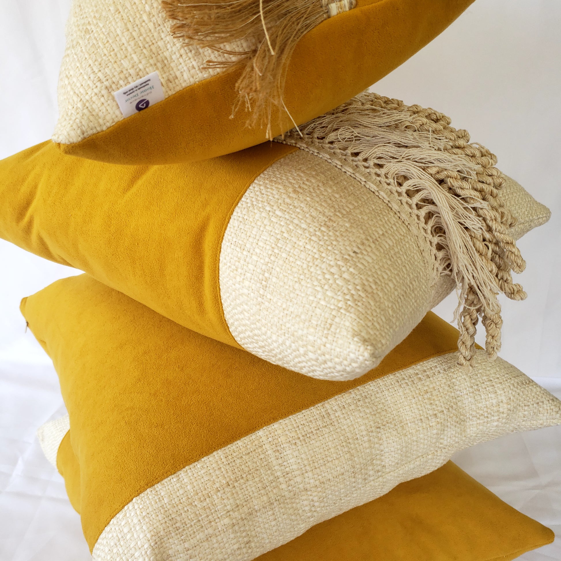 Elevate your home decor with our Fiokim Mustard Deluxe Square Pillow Cover. Crafted with luxurious mustard suede-like fabric, this designer pillow features a sophisticated woven ivory and beige design. Perfect for your sofa or bedroom, its matching reverse and double stitched, sealed edges add a touch of elegance. The invisible zipper ensures a seamless and polished look.
Unique luxury throw decorative pillow for your home.