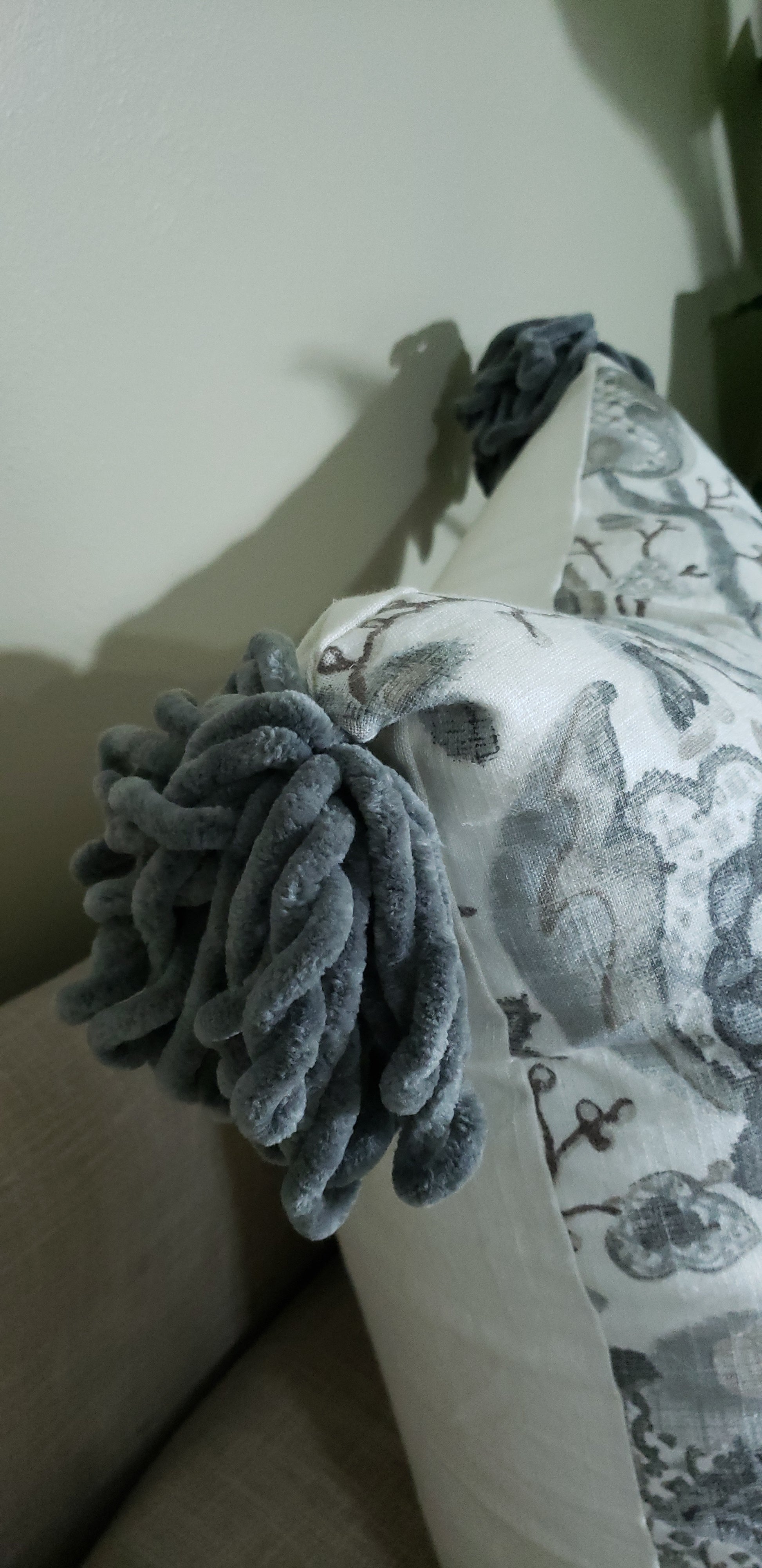 Transform an ordinary couch into an inviting sanctuary with our Grey Serenity Decorative Cushion Cover. Crafted with luxurious, soft linen blend fabric and eye-catching chunky tassels, it adds unique sophistication to your home. Enjoy the beauty and comfort of the designer throw pillow's muted colors and make your living space a peaceful oasis. Experience the lavish lifestyle!
 
Highlights 

Made from Diantha Grey P Kaufmann Fabric

Hand-made 

Unique design

