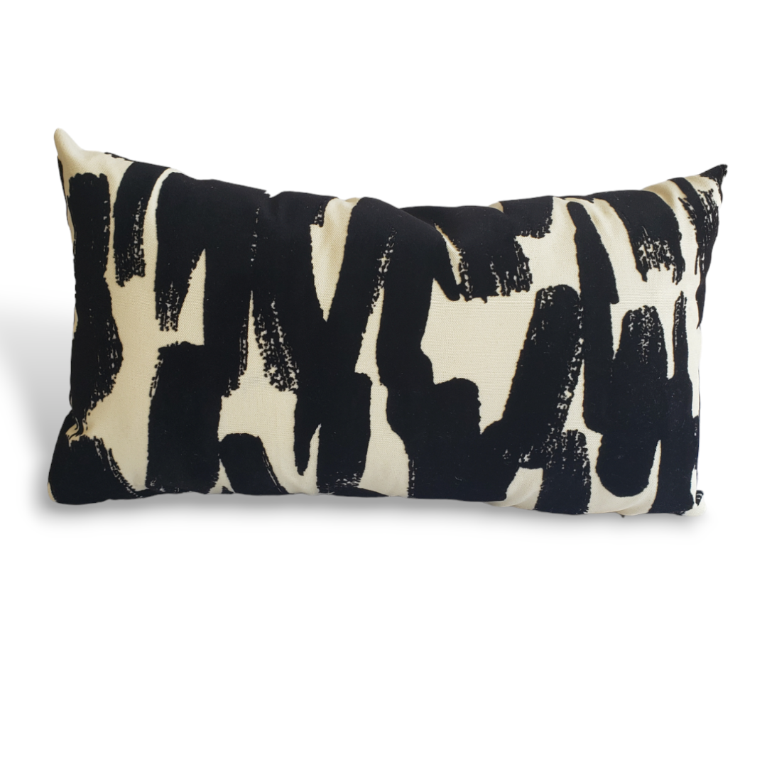 Janaya Opulent Strokes Black and White Designer Decorative Pillow Covers.Elevate your home decor with the Janaya Opulent Strokes Black and White Designer Decorative Pillow Covers. Handmade with designer textured velvet fabric, these covers boast bold black brush strokes for a timeless touch. Make a statement in any room with these daring covers.
