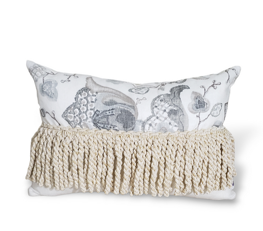 Introducing the Luxury Tasseled Lumbar P. Kaufmann Pillow Cover: a handmade cushion cover made with exclusive, high-end Kaufmann Diantha Printed Linen Blend Drapery Fabric in Grey, accented with chunky beige tassels for a luxurious and tasteful touch. Elevate your space with this unique statement piec