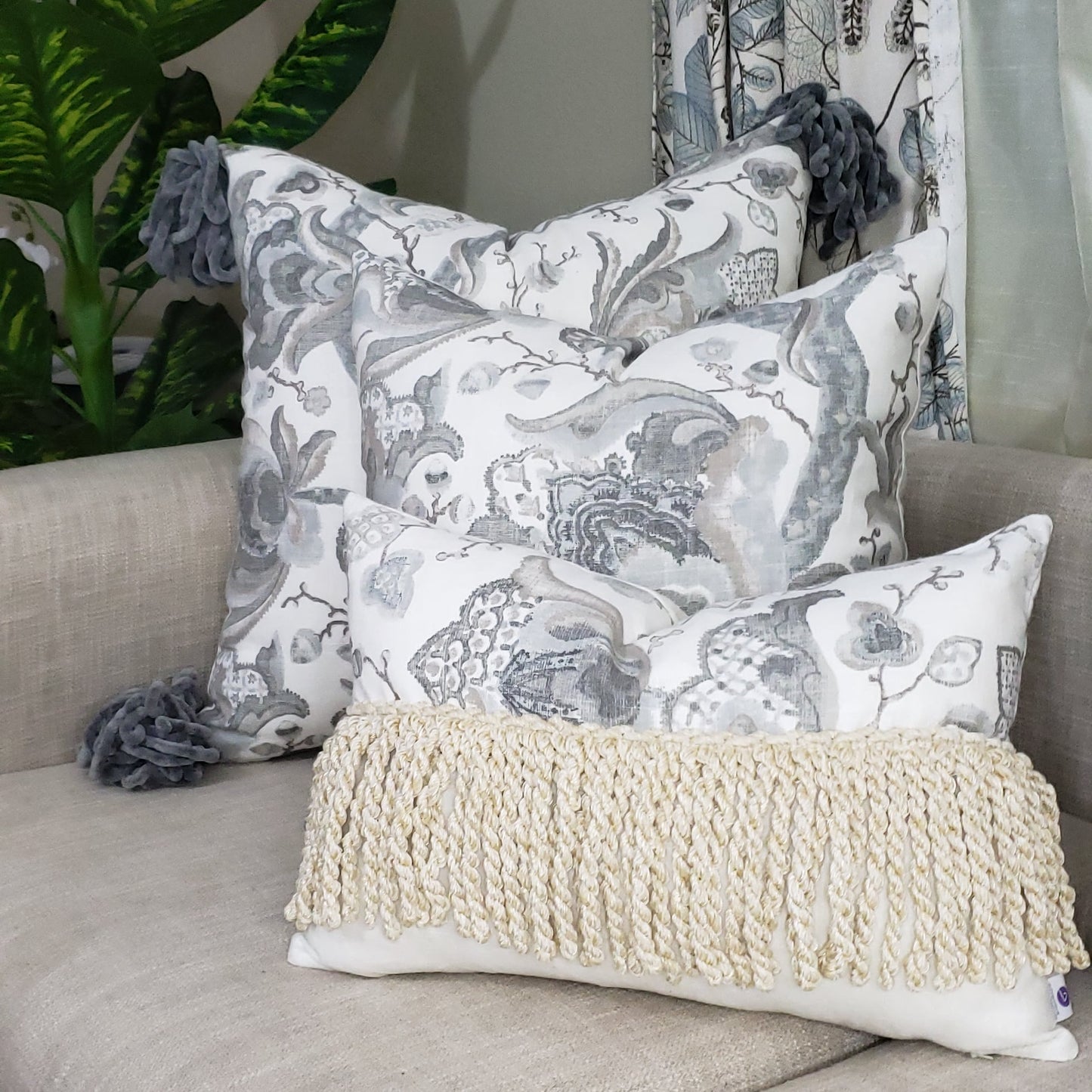 Transform an ordinary couch into an inviting sanctuary with our Grey Serenity Decorative Cushion Cover. Crafted with luxurious, soft linen blend fabric and eye-catching chunky tassels, it adds unique sophistication to your home. Enjoy the beauty and comfort of the designer throw pillow's muted colors and make your living space a peaceful oasis. Experience the lavish lifestyle!
 
Highlights 

Made from Diantha Grey P Kaufmann Fabric

Hand-made 

Unique design

