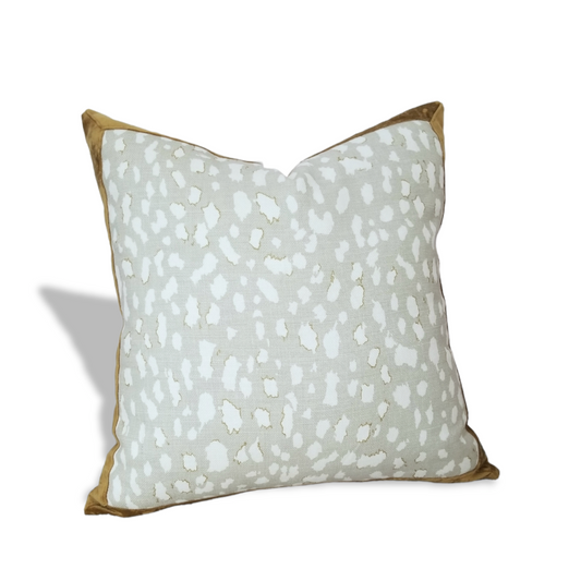 This designer throw pillow is perfect for sprucing up any living room or bedroom. Crafted from the opulent Jan Showers  Lynx Dot Ouster fabric, from her Glamorous  Collection.   Boasting a classic animal pattern on soften Linen to create a timeless look. The 100% linen construction ensures lasting durability and comfort, while the hidden zipper closure allows for easy removal of the pillow cover for cleaning. This designer throw pillow is sure to make a stylish impact in any setting.
