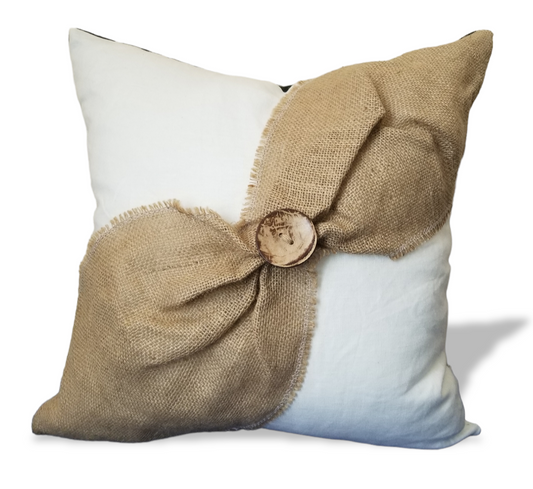 Shop Luxury Designer pillows with Advenique Home Decor.  Our lovely selection of high end decorative pillows adss the perfect finishing touch to your space.  Browse and shop our best selling throw pillows and bed runners for your next interior design project.  Enjoy free international and local shipping on selected orders for shipping to the Caribbean, Canada, USA, UK and Jamaica. Our boho farmhouse designer pillow fits perfect is any space with colors of green and white finish with a burlap accent.