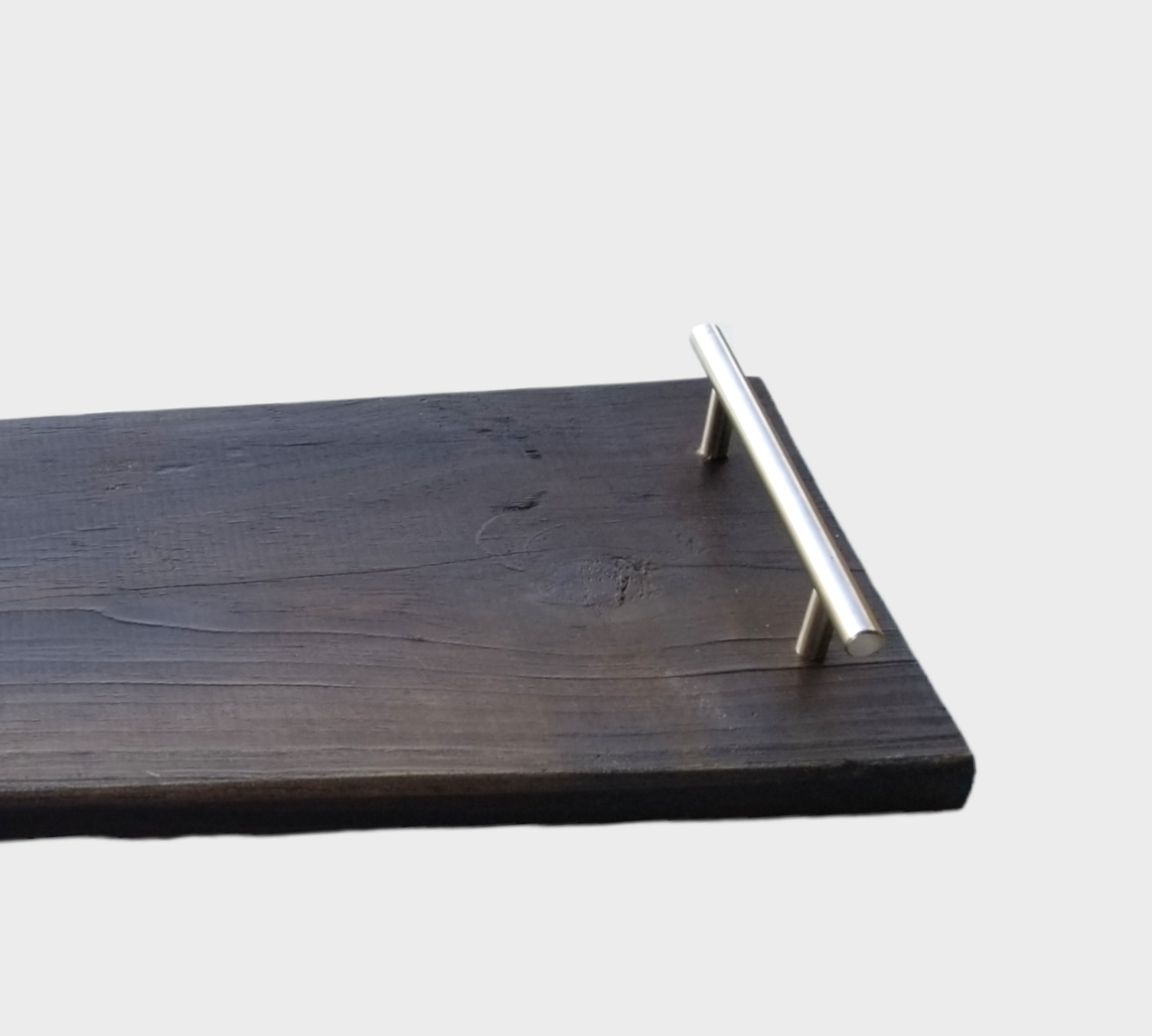  This rustic farmhouse wooden tray is perfect for displaying your favorite decorative pieces. Its distressed dark brown finish adds a vintage charm to any room. Crafted from high-quality wood, its sturdy construction ensures long-lasting use. The tray's handles make it easy to transport from room to room. Perfect for adding a touch of country style to your home, this distressed wooden tray is a classic addition to any decor.  International Shipping