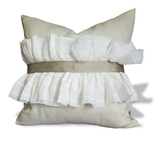 This modern cream ruffled designer throw pillow is perfect for any room in your home. It features a textured reverse side that adds an extra layer of comfort. This pillow is made from high-quality materials, making it both stylish and durable. Its neutral color palette allows it to blend seamlessly with any existing decor. Whether you're looking to add a touch of luxury to your living room or bedroom, this designer throw pillow is a great choice.
